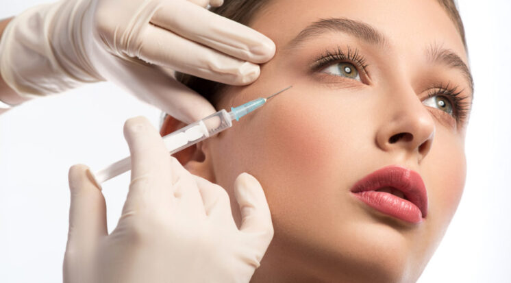 Cute girl receiving hyaluronic acid treatment